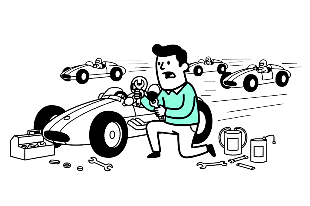 un hombre arreglando un coche de carreras